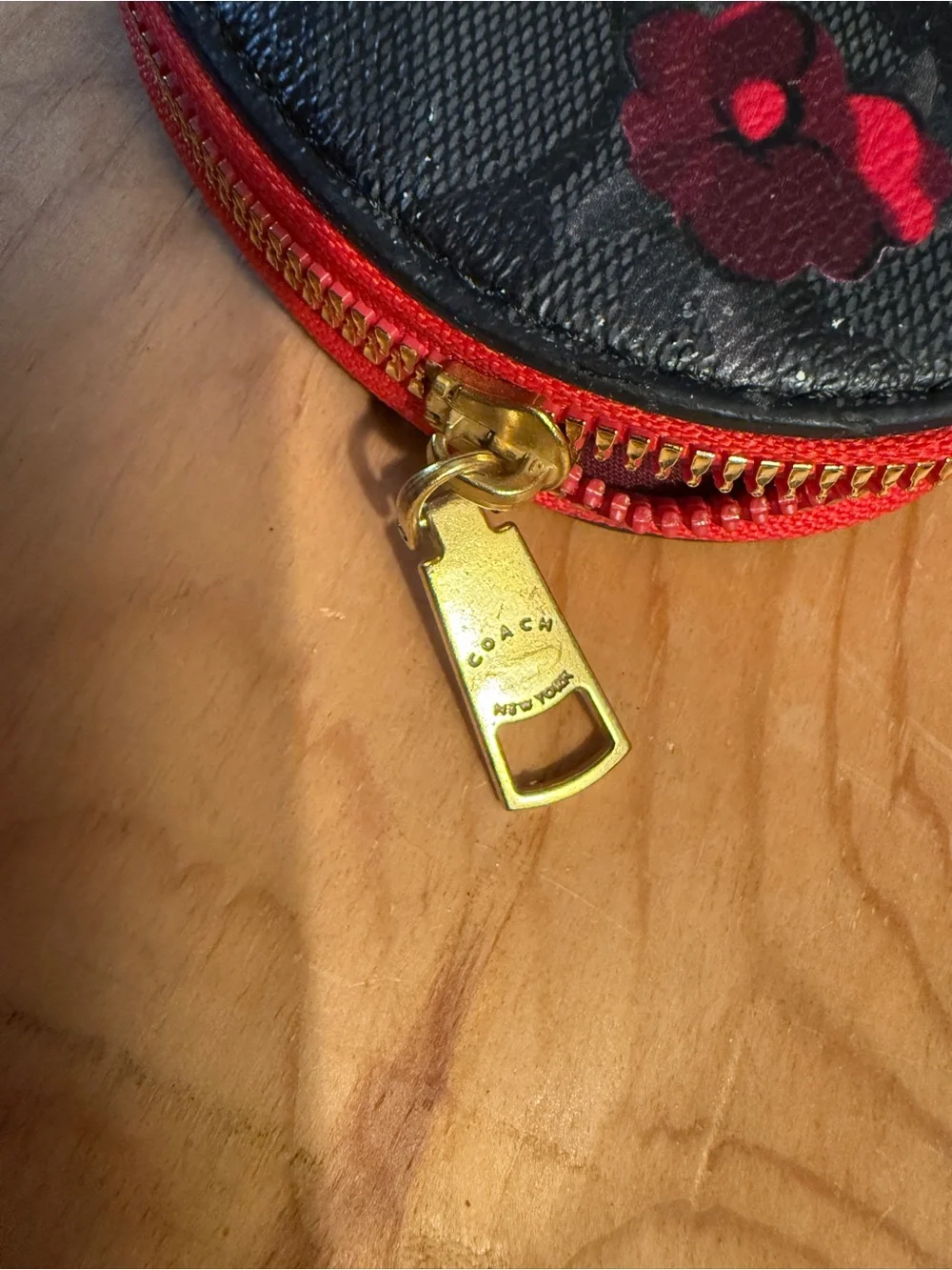 COACH Black Heart Wristlet with Red Floral Print